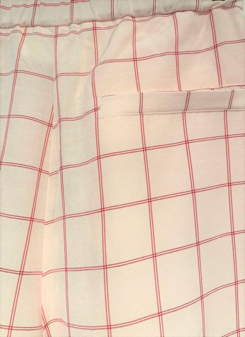 pantalone-palazzo-solotre-dettagio-retro-tasca-a-quadri.jpg